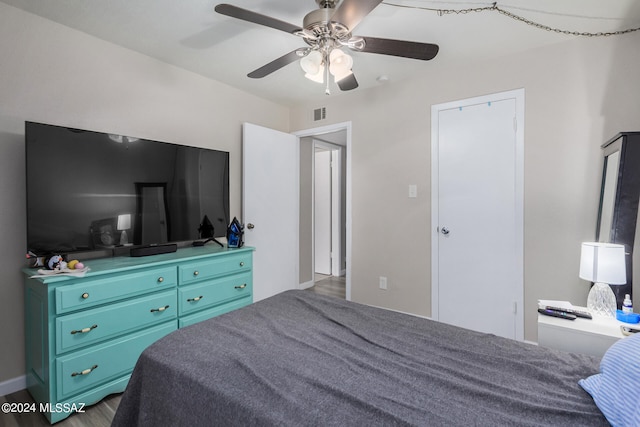 bedroom featuring ceiling fan