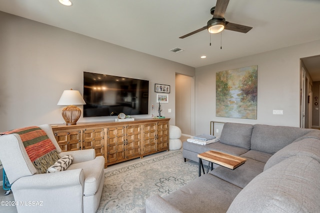 living room featuring ceiling fan