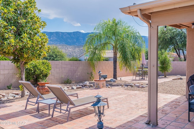 view of patio featuring a mountain view