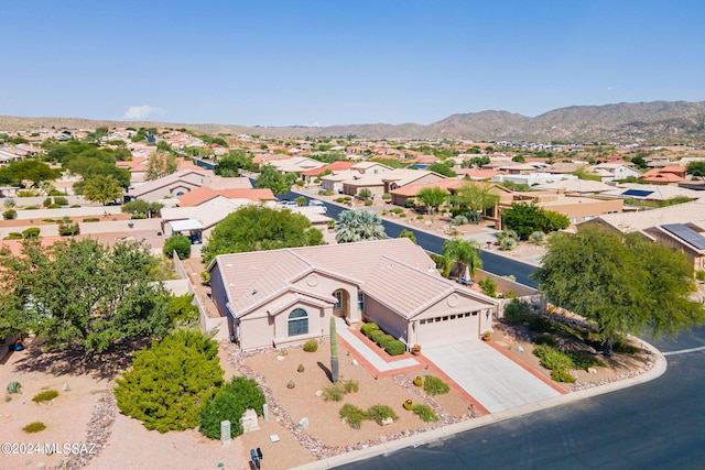 drone / aerial view featuring a mountain view