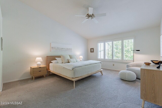 carpeted bedroom featuring a ceiling fan, high vaulted ceiling, and baseboards
