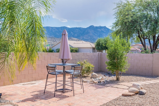 view of patio with a mountain view