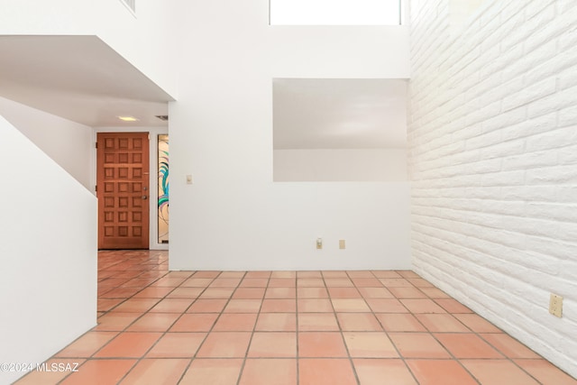 spare room with light tile patterned floors