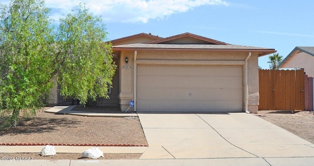 ranch-style home with a garage