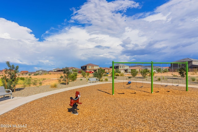 community play area with a residential view