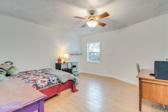 bedroom featuring ceiling fan and light hardwood / wood-style floors