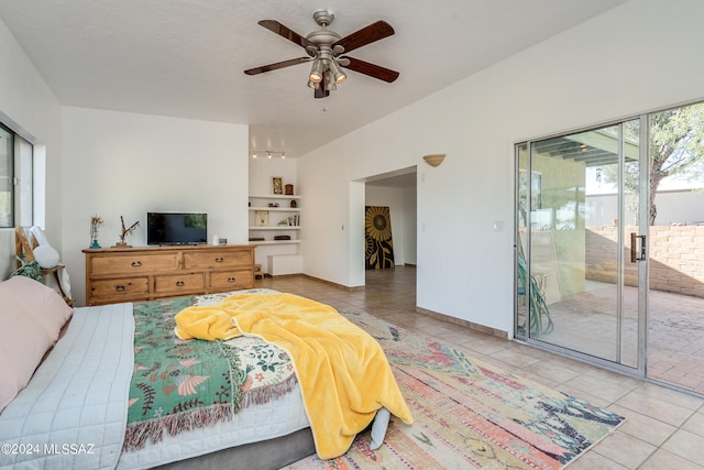 tiled bedroom featuring access to outside and ceiling fan