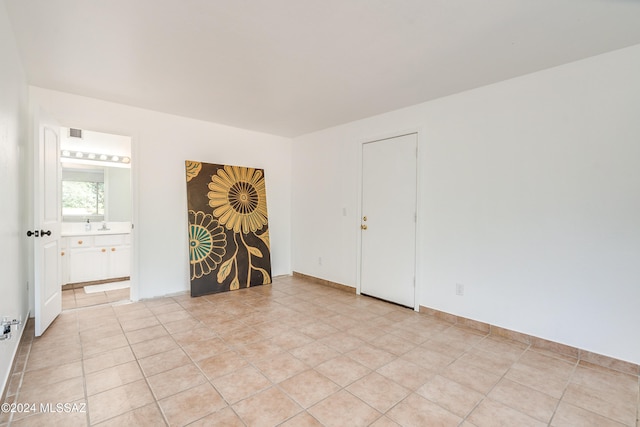 view of tiled spare room