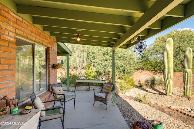 view of patio with ceiling fan