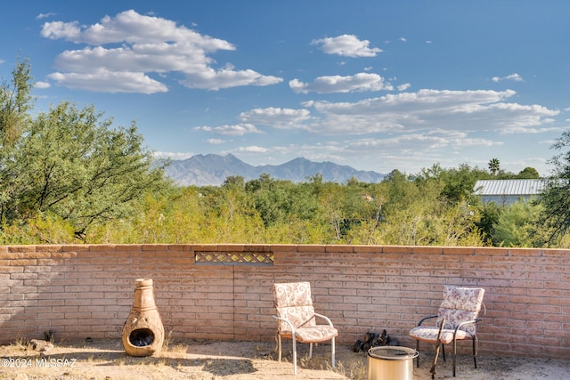 view of patio with a mountain view