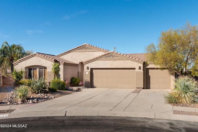 view of front of home with a garage