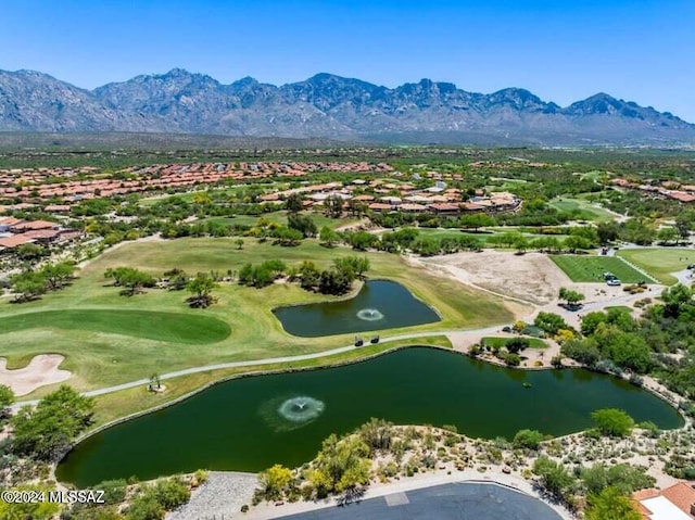 bird's eye view with a water and mountain view