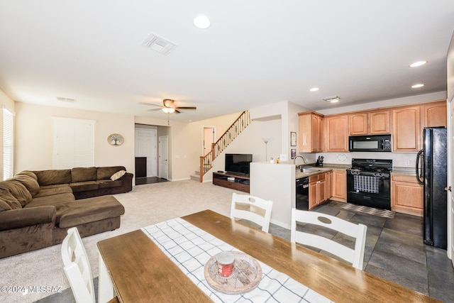 interior space with sink and ceiling fan