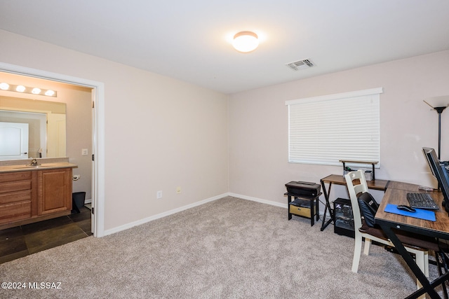 carpeted office with sink