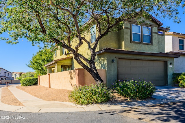 view of front of home featuring a garage