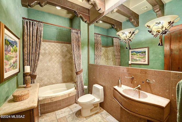 bathroom featuring backsplash, toilet, tile walls, shower / tub combo with curtain, and a notable chandelier