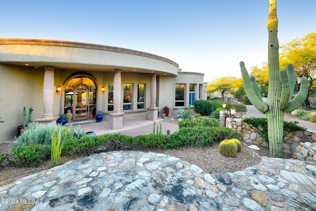 rear view of house with french doors