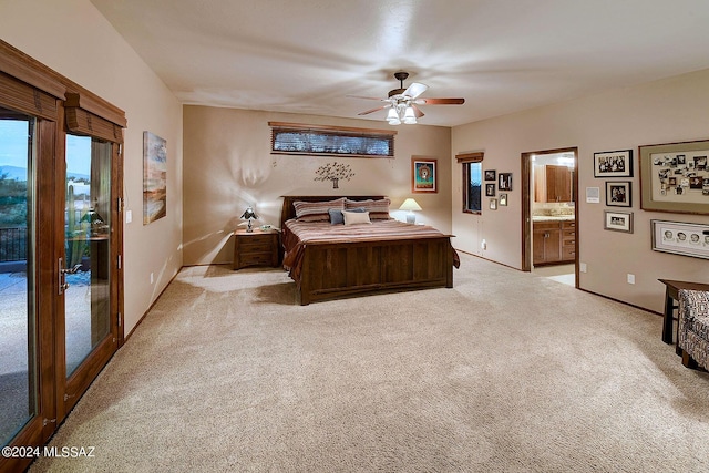 bedroom featuring access to exterior, light colored carpet, and ceiling fan