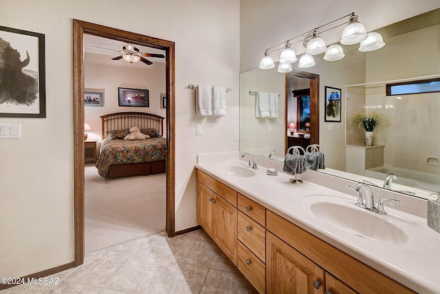 bathroom with vanity, tile patterned flooring, a washtub, and ceiling fan