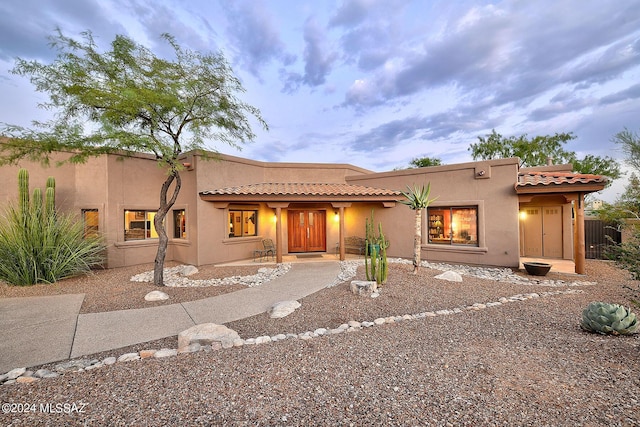 view of adobe home