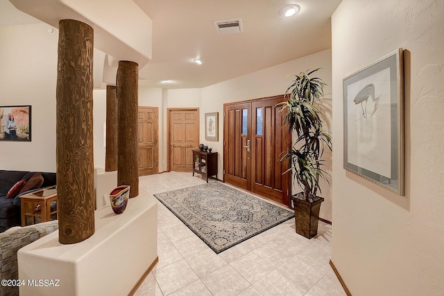 foyer with decorative columns