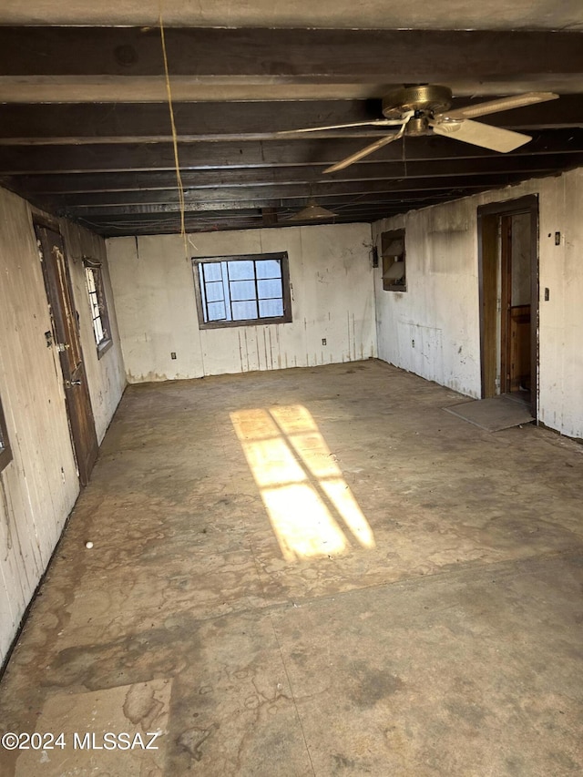 basement with ceiling fan