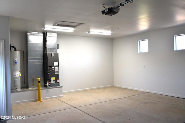 garage with electric water heater, a garage door opener, and baseboards