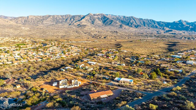 drone / aerial view featuring a mountain view
