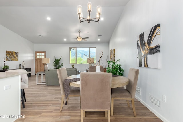 dining room with recessed lighting, visible vents, light wood-style flooring, and baseboards