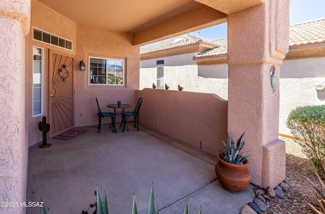 view of patio / terrace featuring a balcony