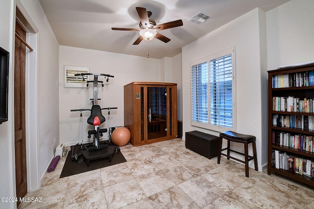 workout room featuring ceiling fan