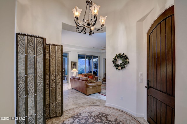 foyer featuring a notable chandelier