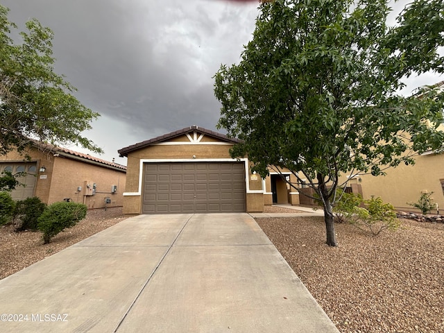 view of front of property featuring a garage