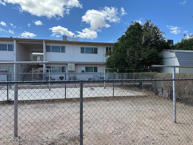 view of swimming pool with fence