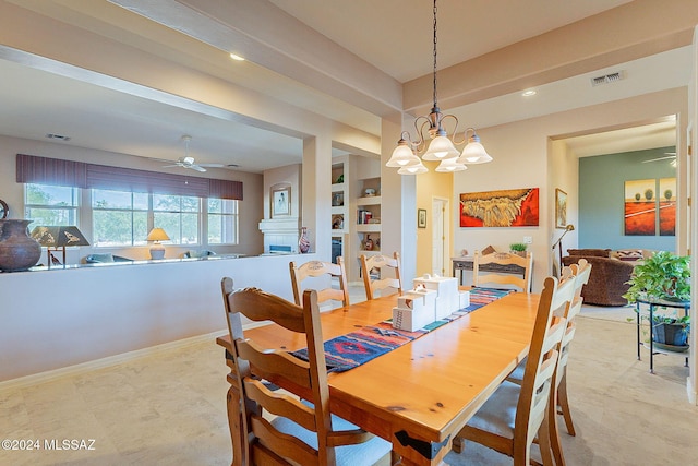 dining room featuring ceiling fan with notable chandelier