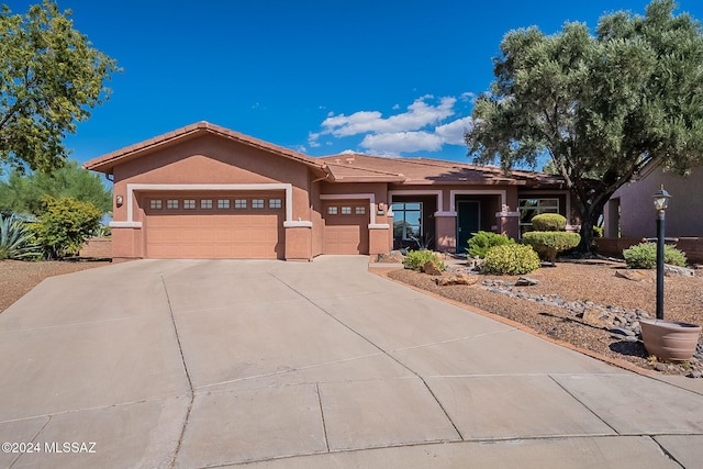 prairie-style home with a garage