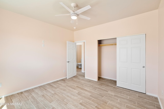 unfurnished bedroom with light hardwood / wood-style flooring, a closet, and ceiling fan