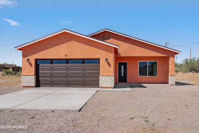 view of front of home featuring a garage