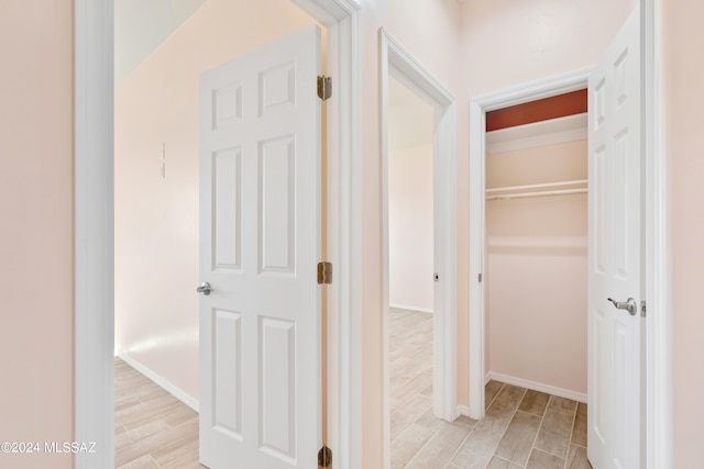 hallway featuring light wood-type flooring