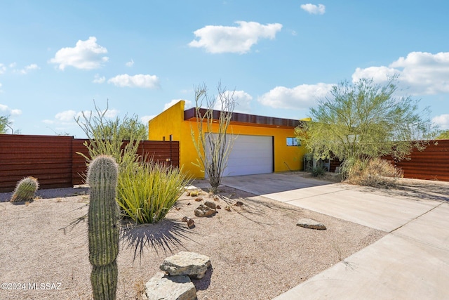 exterior space with a garage