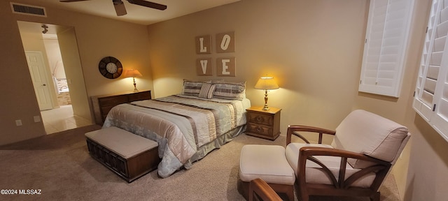 carpeted bedroom featuring ceiling fan