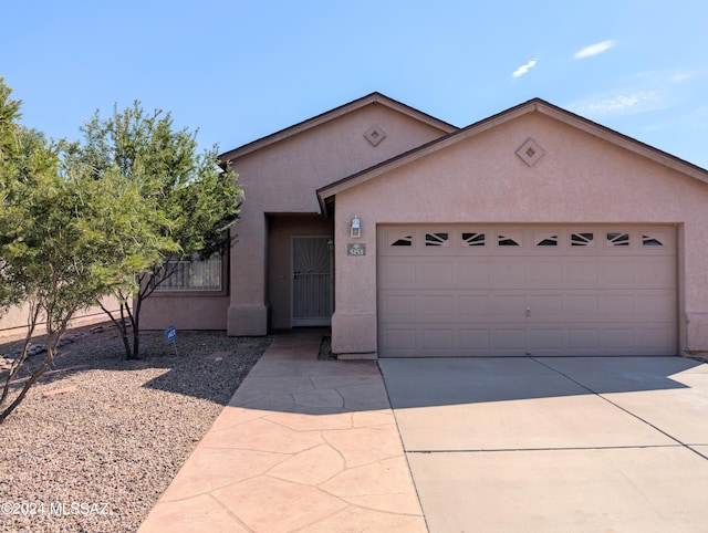 ranch-style house with a garage