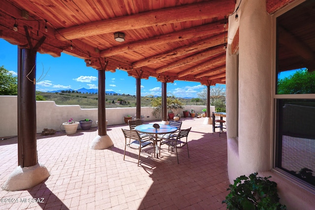 view of patio with a mountain view