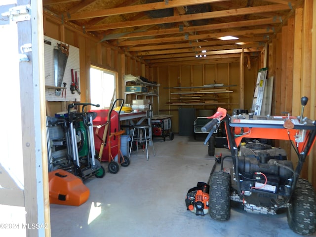 garage with a workshop area