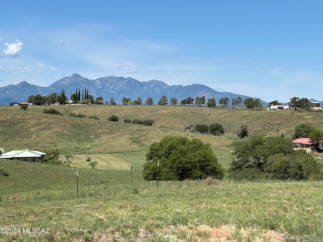 view of mountain feature with a rural view