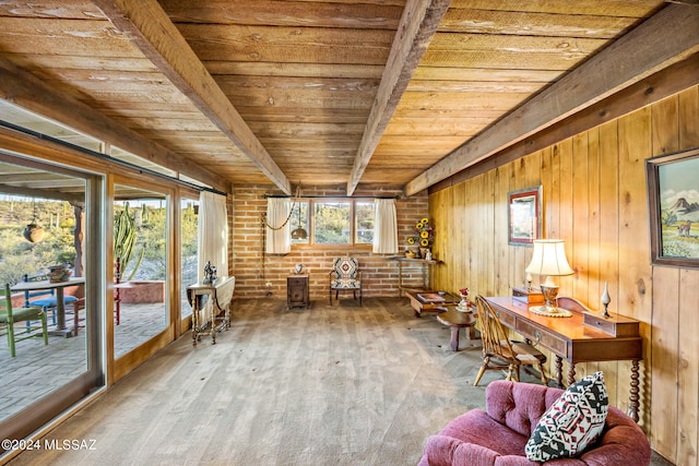 unfurnished sunroom with beamed ceiling and wooden ceiling