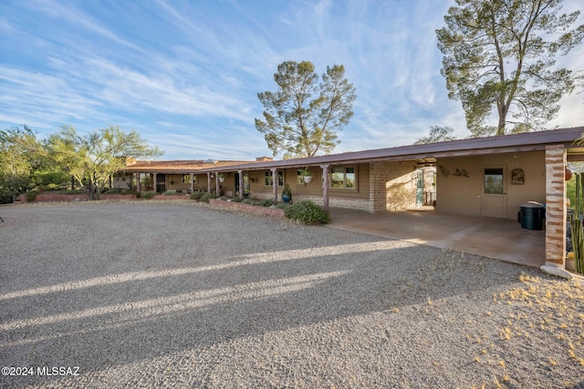 exterior space with a carport