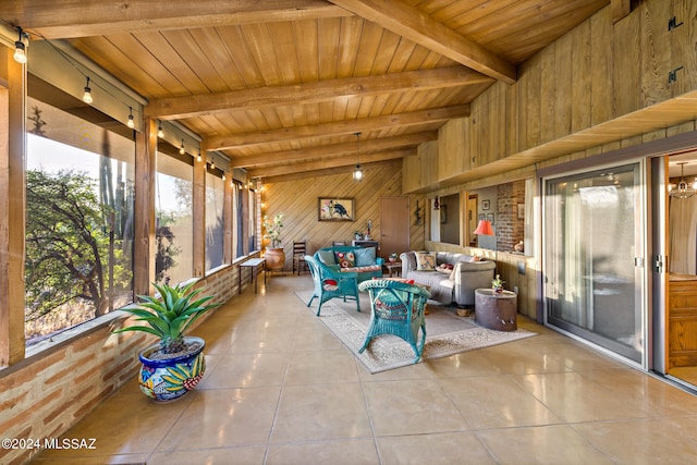 sunroom featuring wooden ceiling and vaulted ceiling with beams