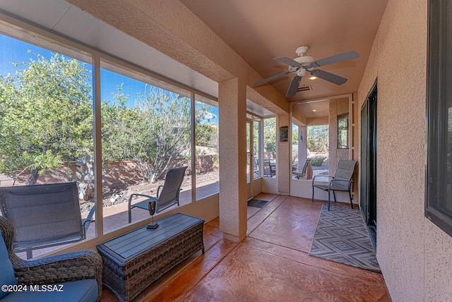 sunroom / solarium with ceiling fan