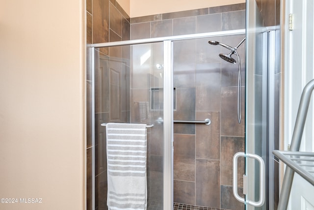 bathroom with an enclosed shower